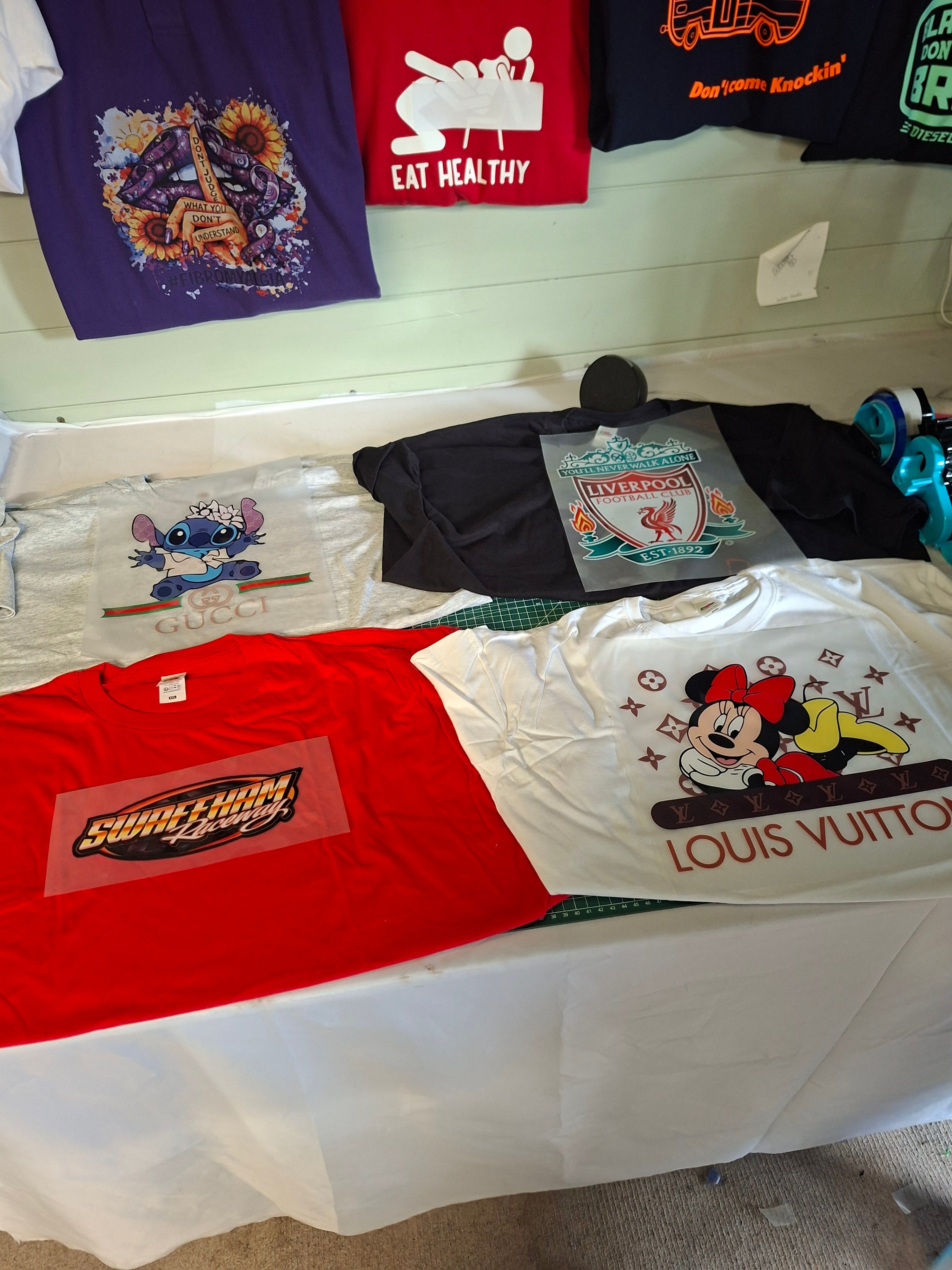 DTFs available to be printed on T Shirts, Hoodies, Jumpers And polo Shirts